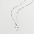 Mini Silver Cross Charm Necklace Mini sterling silver cross charm necklace gallery image