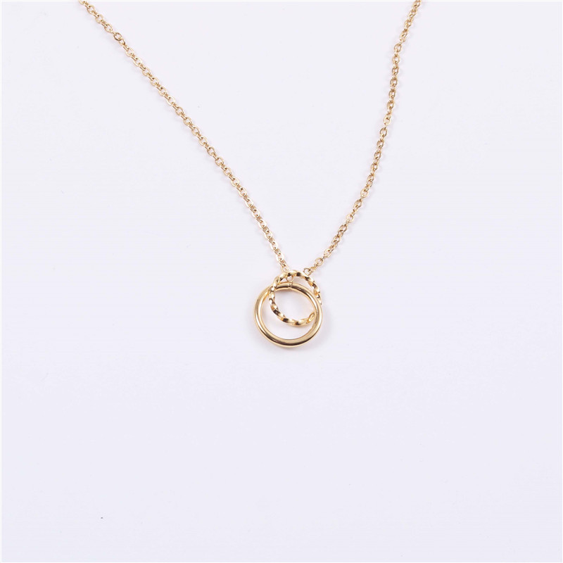 Interlocking Circles Necklace Interlocking circles necklace with a polished circle and hammered circle