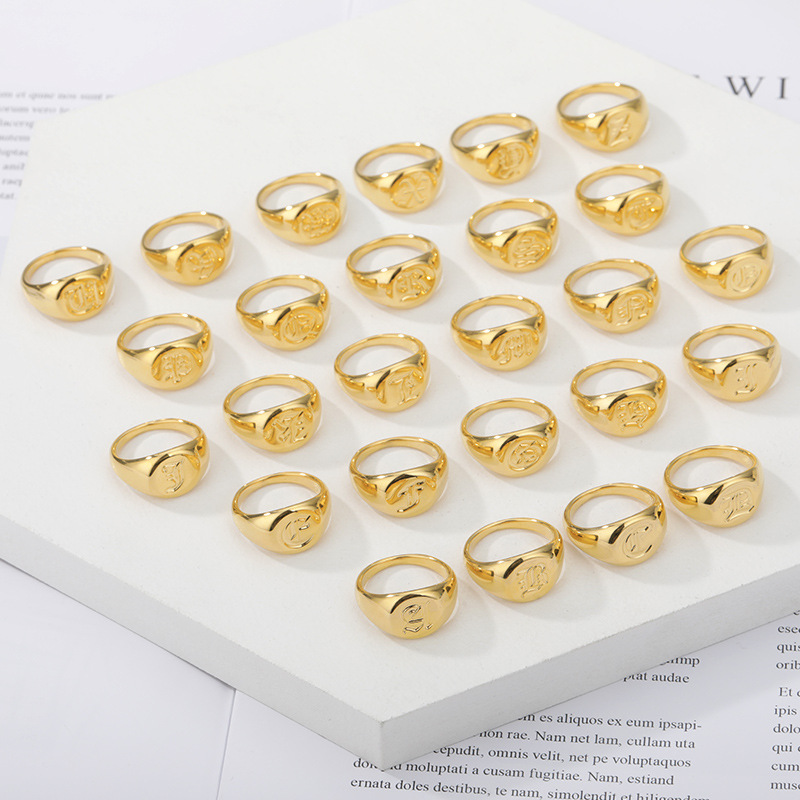 Gold-Plated Engraved Signet Ring Gold-plated signet ring with monogram engraving