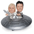 Flying Saucer Couple Figurine Couple figurine with flying saucer background