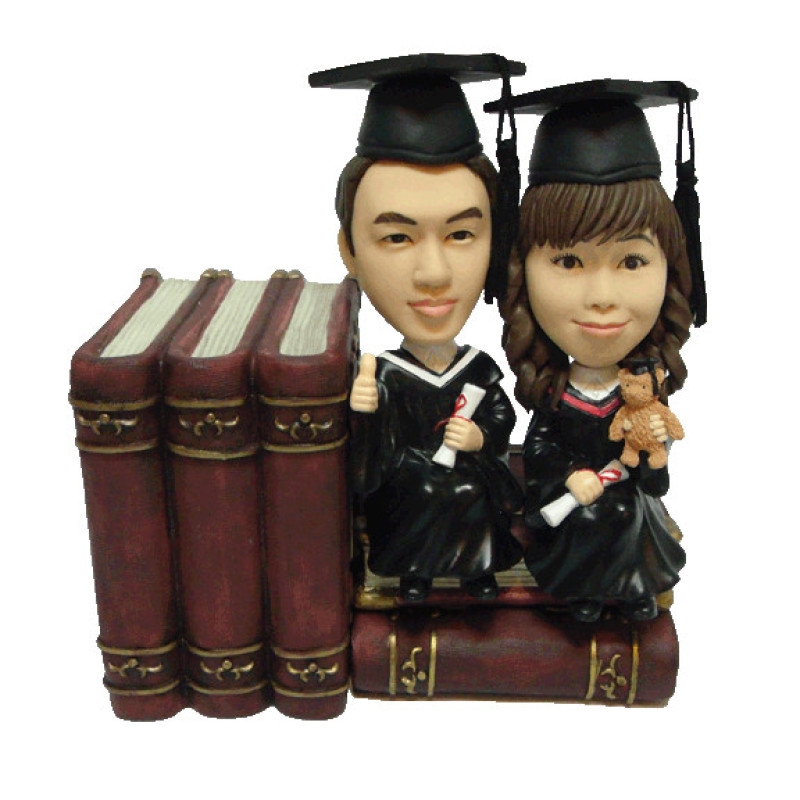 Graduation Couple Figurine Bookends Graduation couple figurine bookends