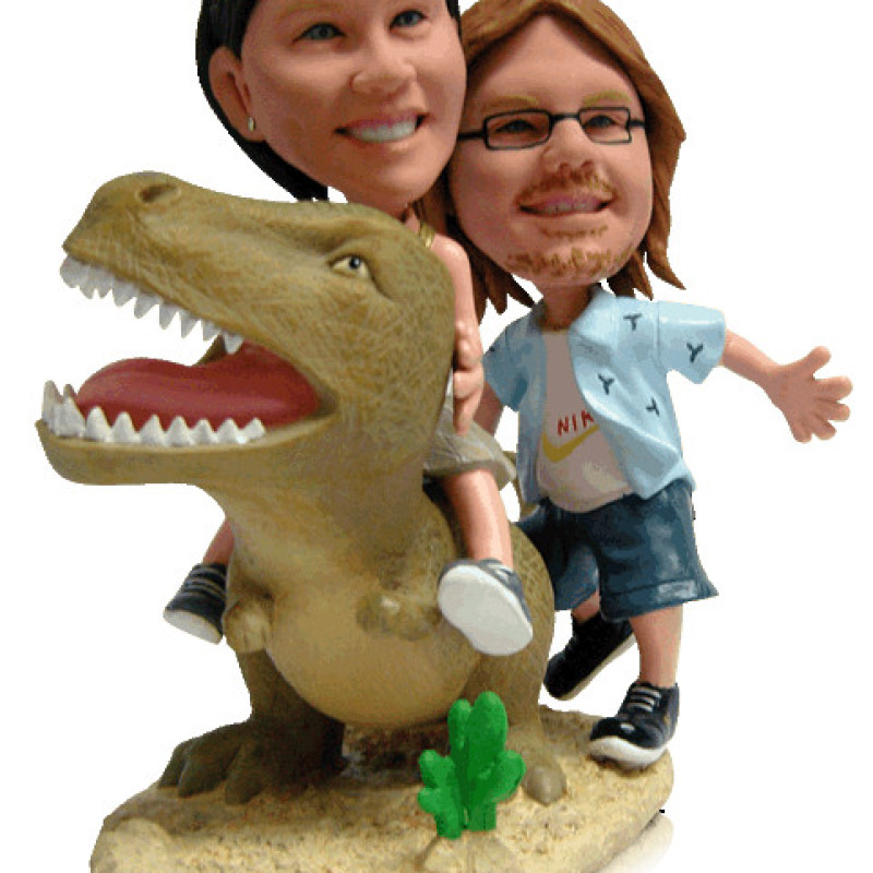Dinosaur Couple Figurine Couple figurine with dinosaur background