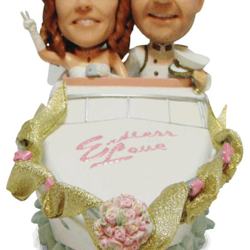 Wedding Boat Couple Figurine Wedding couple figurine in a boat