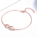Personalised infinity bracelet with a single accent stone row