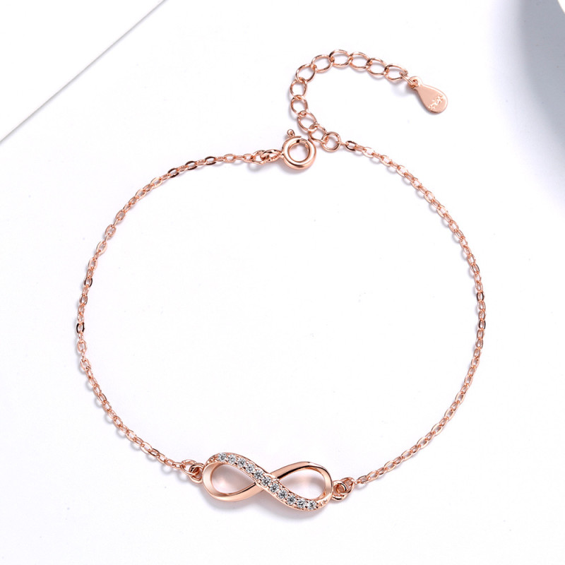 Personalised infinity bracelet with a single accent stone row