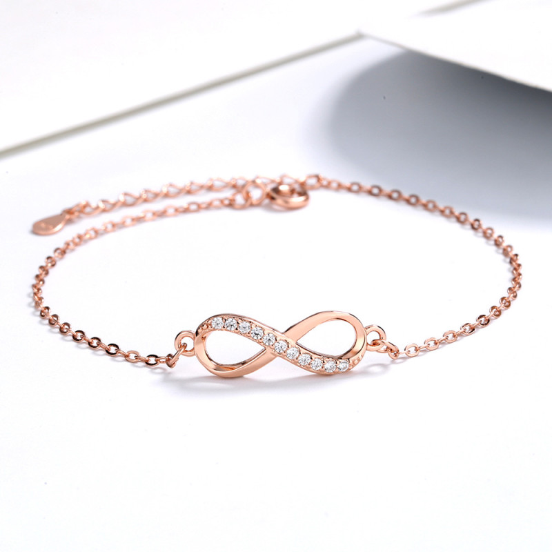 Personalised infinity bracelet with a single accent stone row