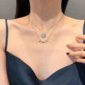 Four-leaf clover heart pendant necklace with sparkling crystals