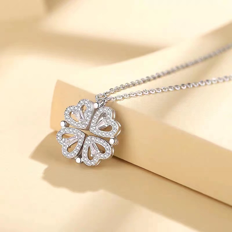 Four-leaf clover heart pendant necklace with sparkling crystals