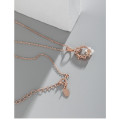 Rose gold flower wreath necklace with pink crystals and pearl
