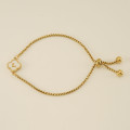 Personalised Gold Clover Bracelet with Monogram Initial Personalised gold-plated clover bracelet with mother-of-pearl pendant and monogram initial