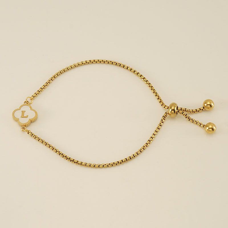 Personalised Gold Clover Bracelet with Monogram Initial Personalised gold-plated clover bracelet with mother-of-pearl pendant and monogram initial