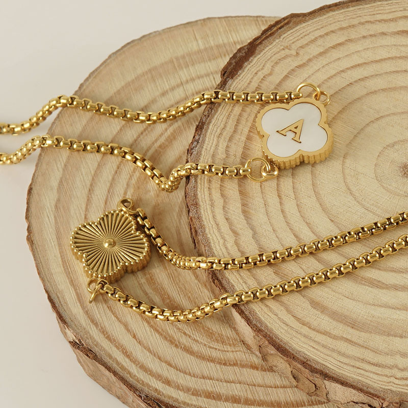 Personalised Gold Clover Bracelet with Monogram Initial Personalised gold-plated clover bracelet with mother-of-pearl pendant and monogram initial