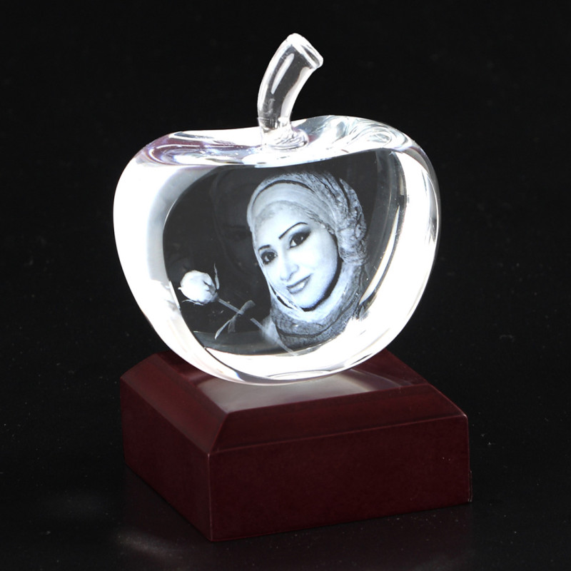 Apple Crystal Engraved Girl Portrait Apple crystal with an engraved girl portrait