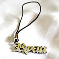 Personalised name charm shown with the name Ryan