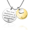 Two-tone gold Mother Forever pendant