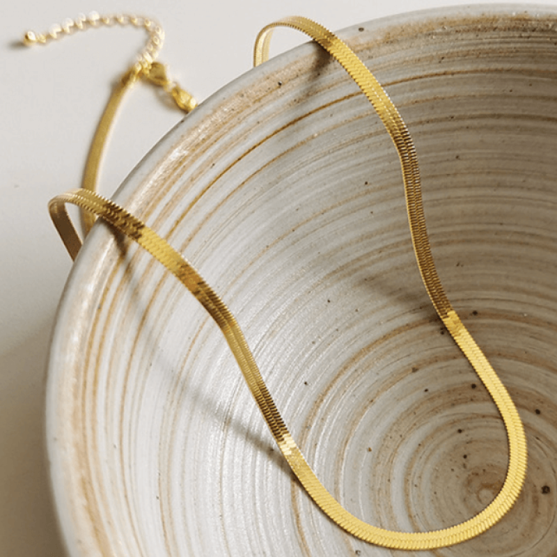 Gold flat snake chain necklace in sterling silver