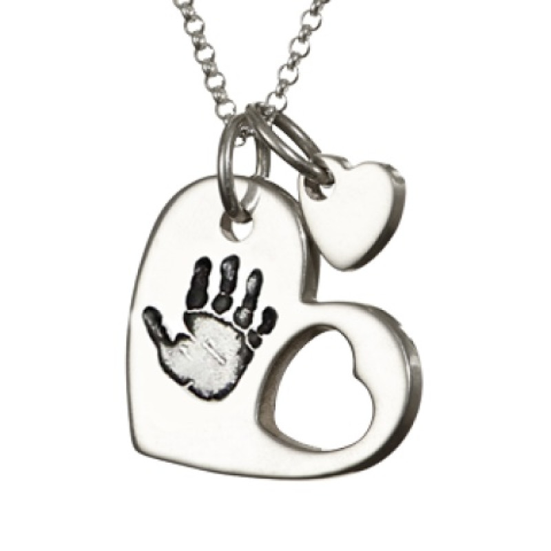 Sterling silver cut-out heart handprint necklace