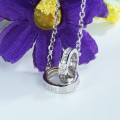 Interlocking Circles Necklace Interlocking circles necklace with a polished circle and hammered circle