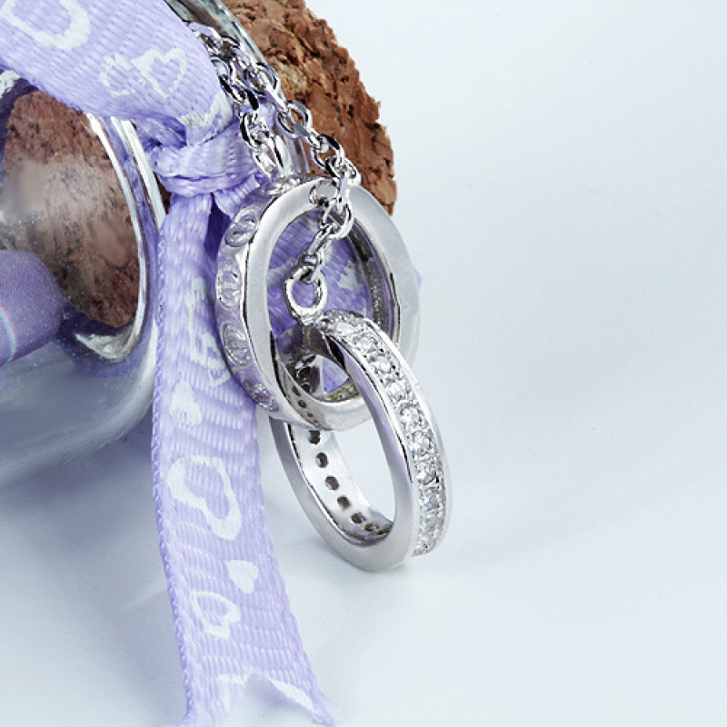 Interlocking Circles Necklace Interlocking circles necklace with a polished circle and hammered circle