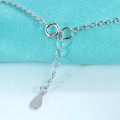 Interlocking Circles Necklace Interlocking circles necklace with a polished circle and hammered circle