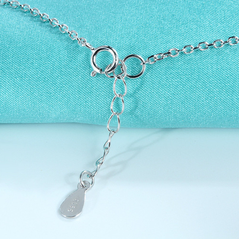Interlocking Circles Necklace Interlocking circles necklace with a polished circle and hammered circle
