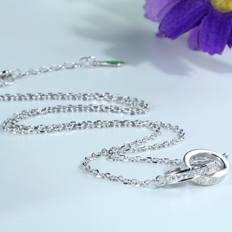 Interlocking Circles Necklace Interlocking circles necklace with a polished circle and hammered circle