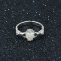 Sterling silver Claddagh ring with heart-cut synthetic white opal stone