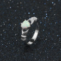 Sterling silver Claddagh ring with heart-cut synthetic white opal stone