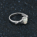 Sterling silver Claddagh ring with heart-cut synthetic white opal stone
