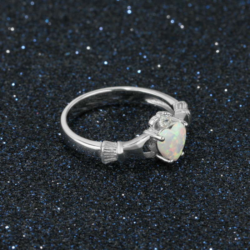 Sterling silver Claddagh ring with heart-cut synthetic white opal stone