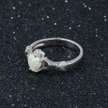 Sterling silver Claddagh ring with heart-cut synthetic white opal stone