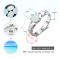 Sterling silver Claddagh ring with heart-cut synthetic white opal stone