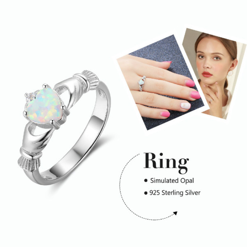 Sterling silver Claddagh ring with heart-cut synthetic white opal stone