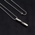 Long Man Silver Pendant – Geometric Möbius Strip Long Man Silver Pendant with geometric Möbius strip design
