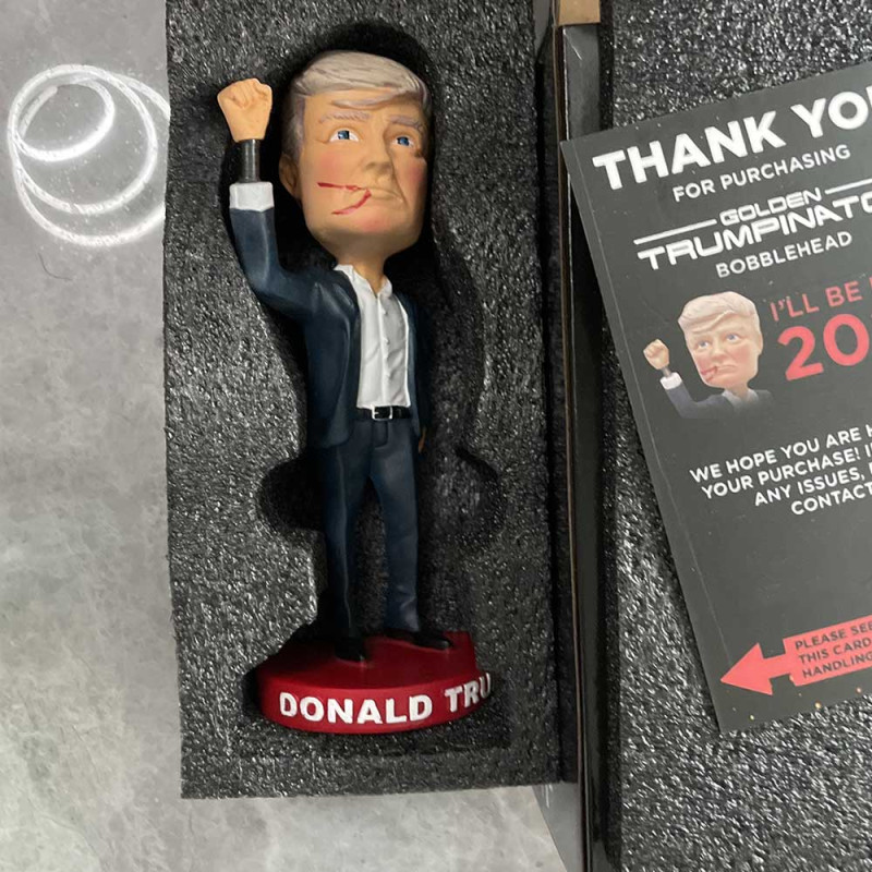Donald Trump MAGA Bobblehead – 7-Inch Resin Collectible Donald Trump MAGA bobblehead with a raised fist-pumping pose