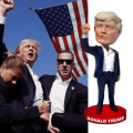 Donald Trump MAGA Bobblehead – 7-Inch Resin Collectible Donald Trump MAGA bobblehead with a raised fist-pumping pose