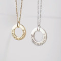 Personalised circle washer necklace with hand-stamped text