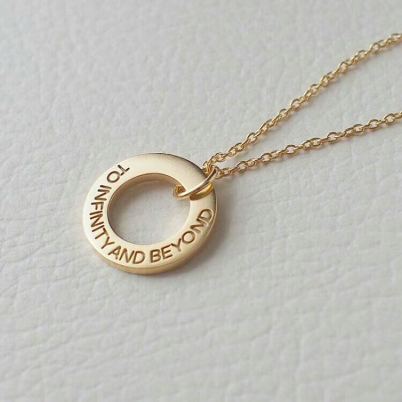 Personalised circle washer necklace with hand-stamped text