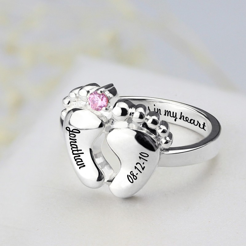 Engraved baby feet ring with birthstone detail