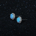 Cultured Blue Opal Stud Earrings in Sterling Silver Round cultured blue opal stud earrings in sterling silver