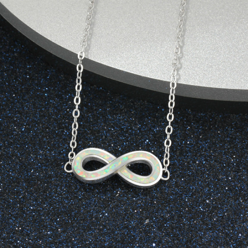 White Opal Infinity Bracelet in Sterling Silver White opal infinity bracelet with personalised engraving in sterling silver