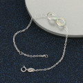 White Opal Infinity Bracelet in Sterling Silver White opal infinity bracelet with personalised engraving in sterling silver
