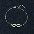 White Opal Infinity Bracelet in Sterling Silver White opal infinity bracelet with personalised engraving in sterling silver