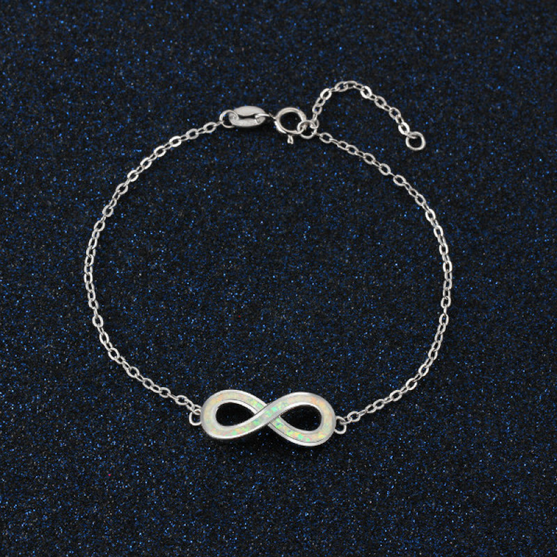 White Opal Infinity Bracelet in Sterling Silver White opal infinity bracelet with personalised engraving in sterling silver