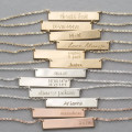 Personalised silver bar necklace with engraved text and icon detail