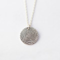 Personalised Sterling Silver Fingerprint Circle Pendant Personalised sterling silver circle pendant engraved with a fingerprint