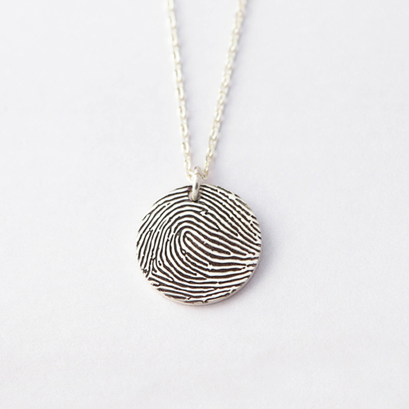 Personalised Sterling Silver Fingerprint Circle Pendant Personalised sterling silver circle pendant engraved with a fingerprint