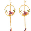 Long tassel hook drop earrings with enamel flower and bird