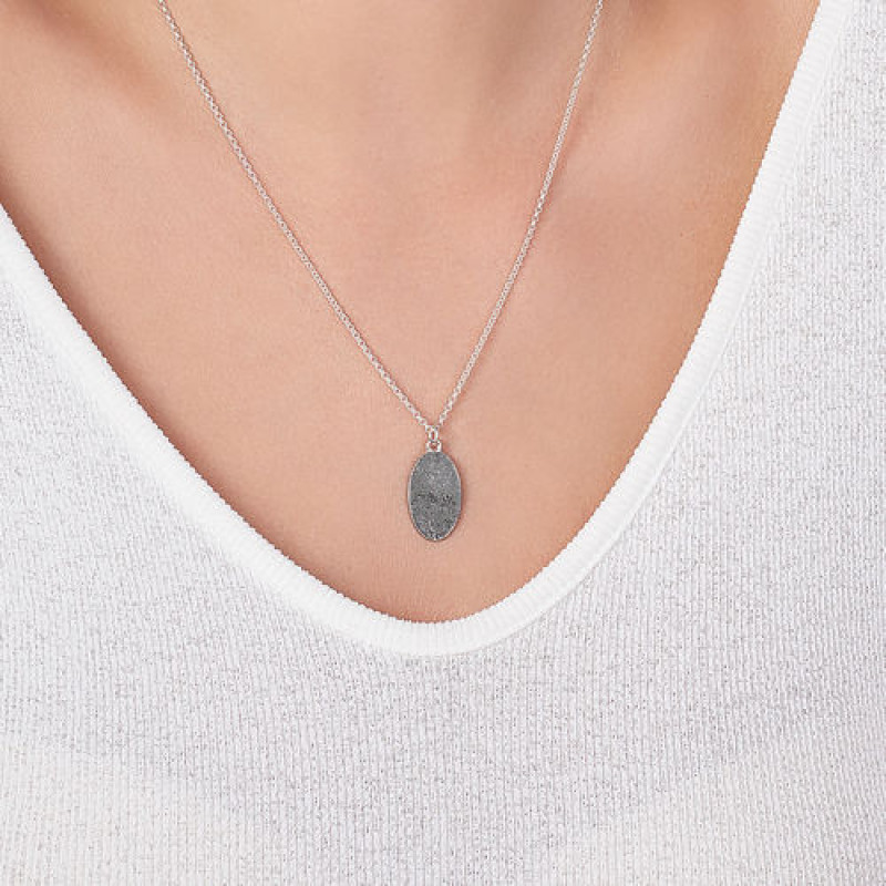 Fingerprint oval necklace with a personalised silver teardrop pendant