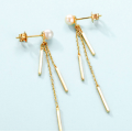 Gold Plated Sterling Silver Pearl Tassel Earrings Gold-plated sterling silver tassel drop earrings with natural pearl